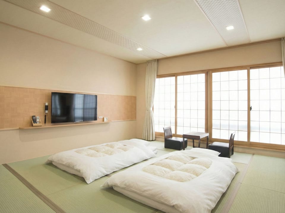 Japanese-style Room, Japanese Futon, Non Smoking, City View | Down comforters, in-room safe, blackout drapes