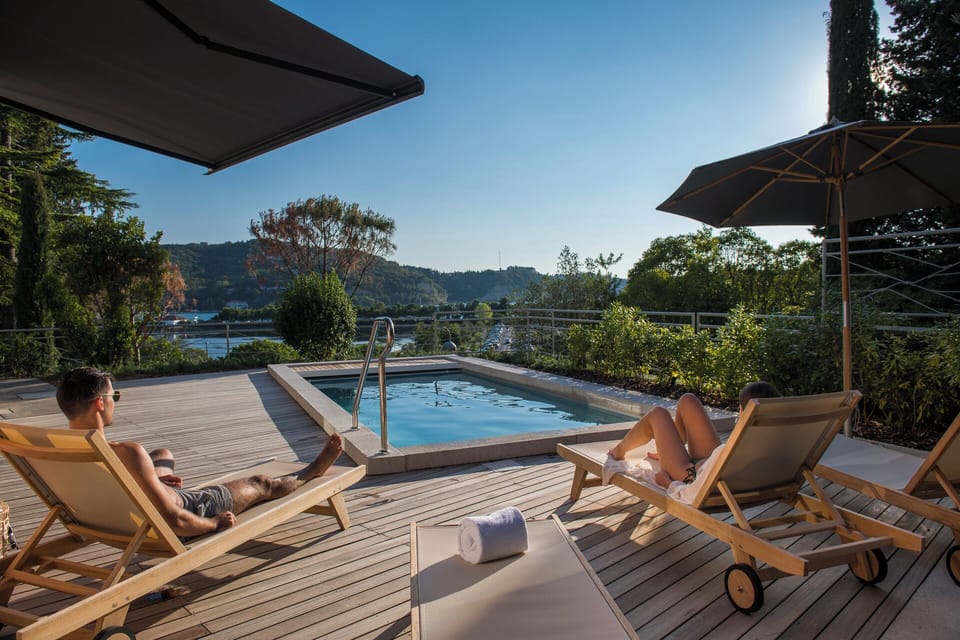 Outdoor pool, pool umbrellas, sun loungers