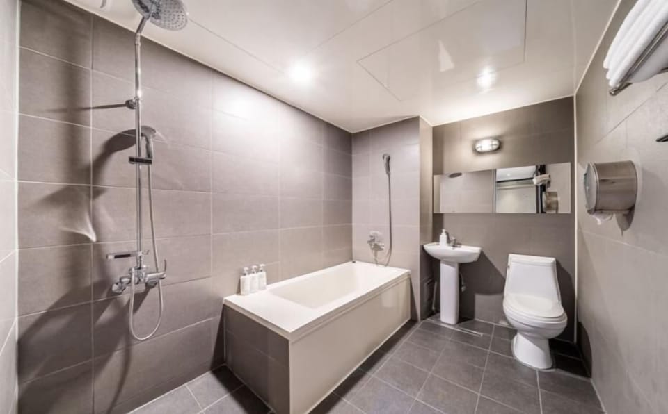 Superior Room | Bathroom | Hair dryer, bathrobes, slippers