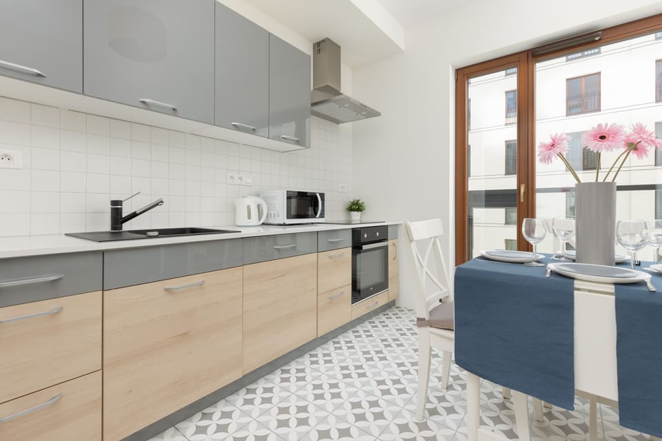 Cook and dine in style with the modern kitchenette and dining area.