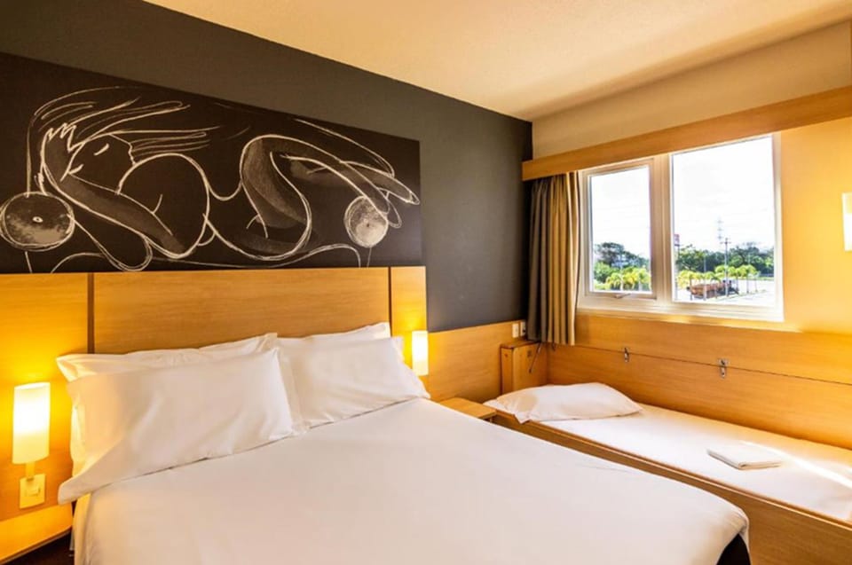 Standard Apartment, Multiple Beds | Minibar, in-room safe, desk, blackout drapes