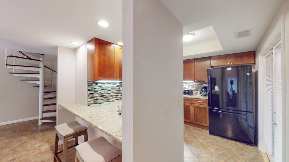 Fully Stocked Kitchen with Pass-Through Window