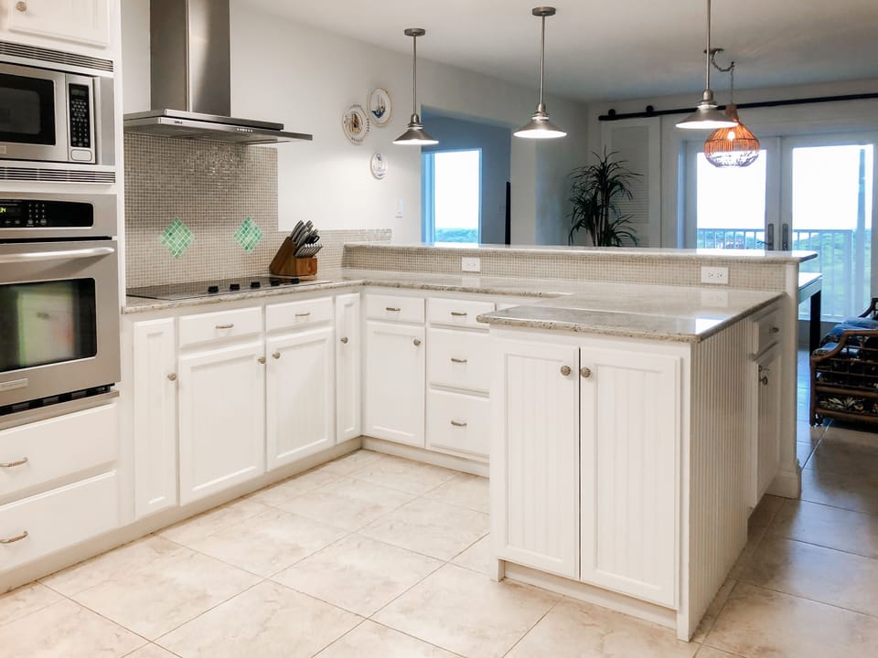 Enjoying ocean views while cooking in our spacious kitchen.