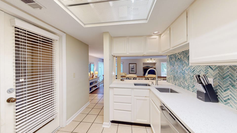 Fully Stocked Kitchen with Pass-Through Window