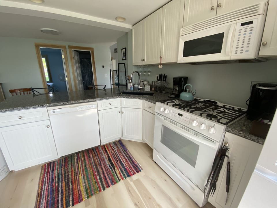 Fully stocked kitchen with new appliances. 