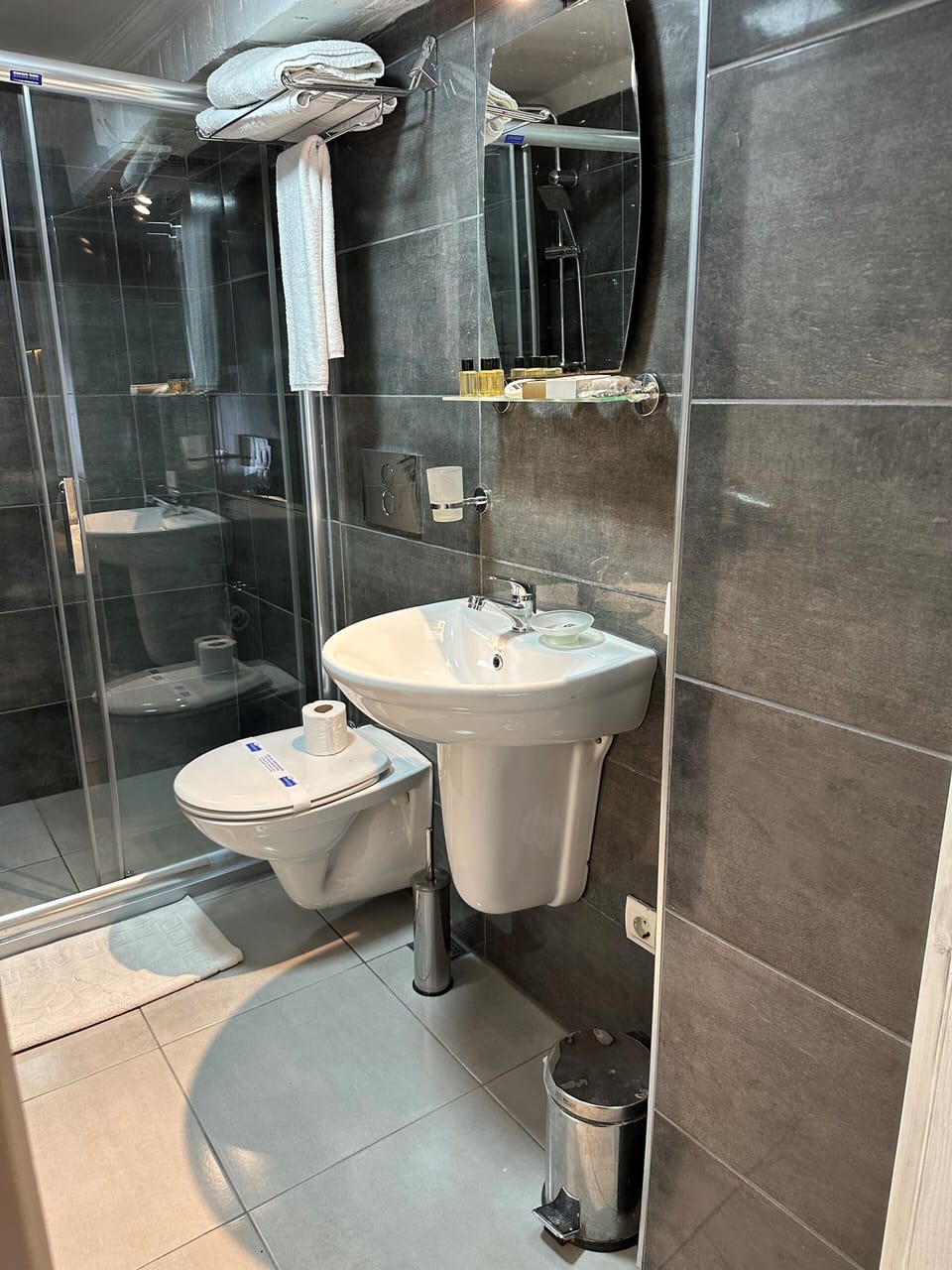 Shower, free toiletries, hair dryer, slippers