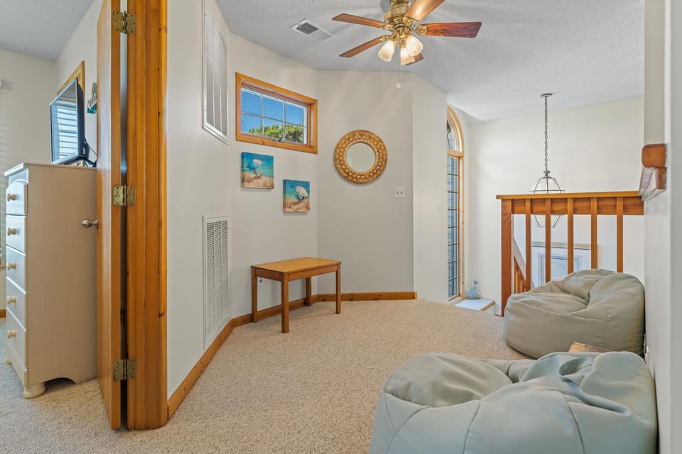 Loft area with cozy seating