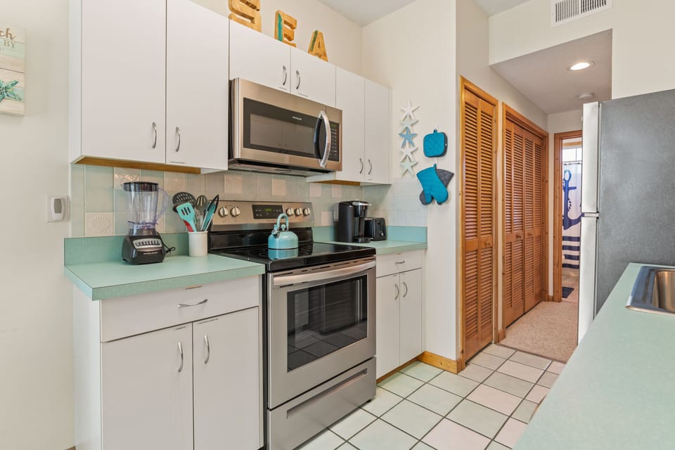 Keurig coffee, with full sized washer/ dryer in the closet to the right