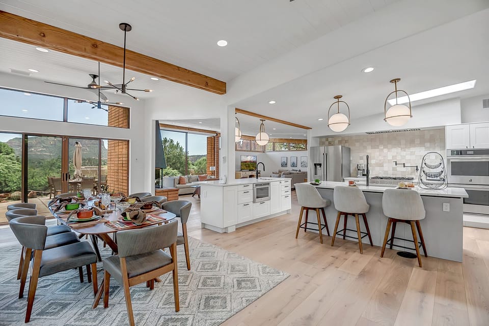 Open Floor Plan with Wood Beams and Tons of Natural Lighting!