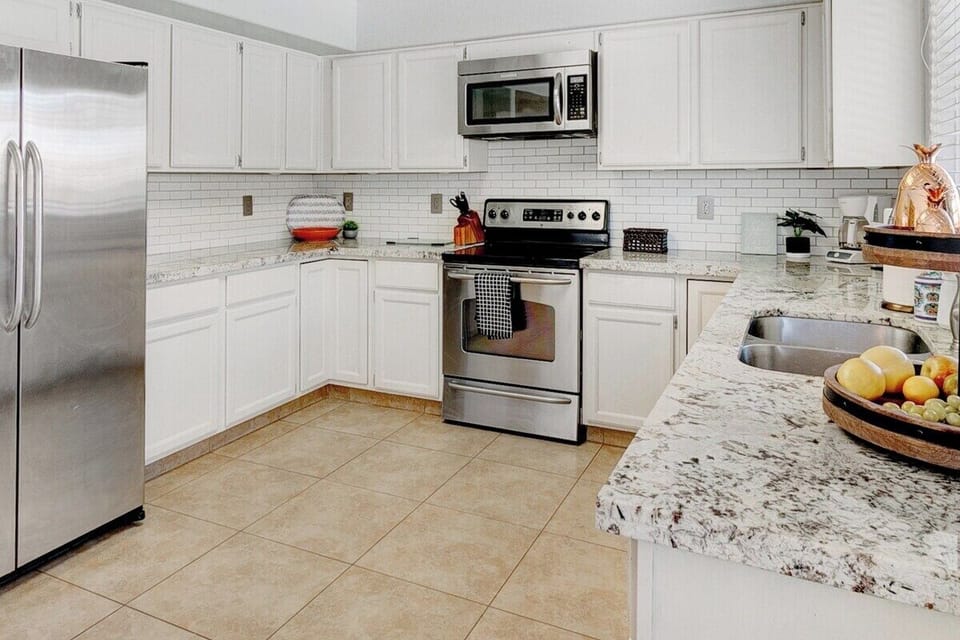 Spacious, fully stocked kitchen.
