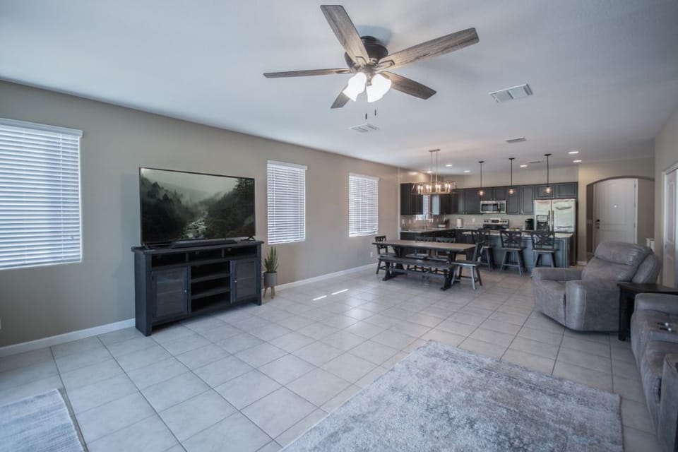 Great Room with 72 inch smart TV 

