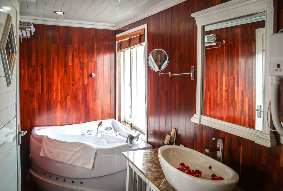 Shower, free toiletries, hair dryer, slippers