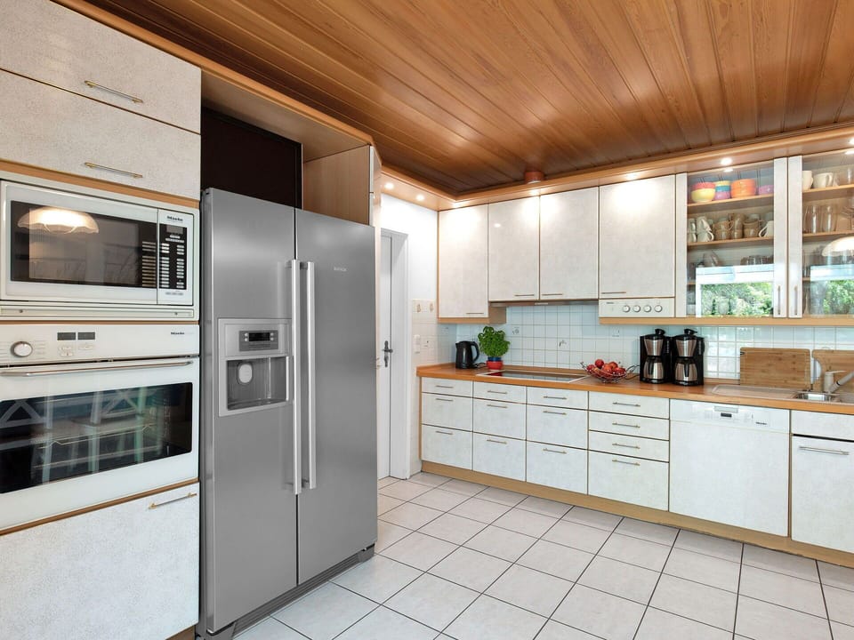 Cabinetry, Countertop, Kitchen Appliance, Kitchen Stove, Kitchen, Building, Home Appliance, Interior Design, Wood, Major Appliance