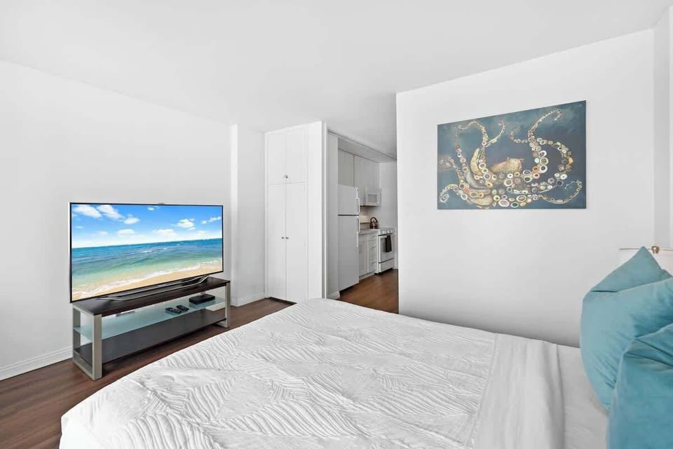 Bed with wide TV