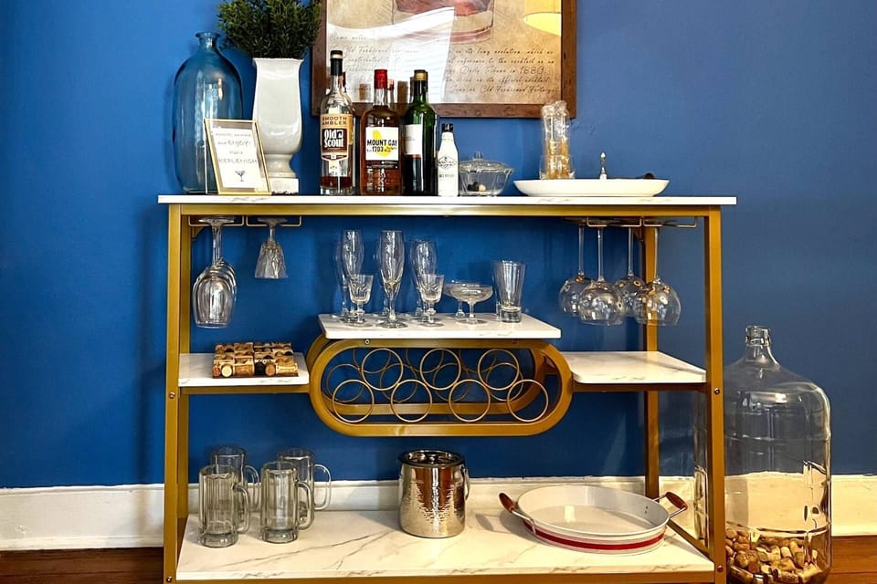 There is plenty of glassware at the bar to entertain at dinner.