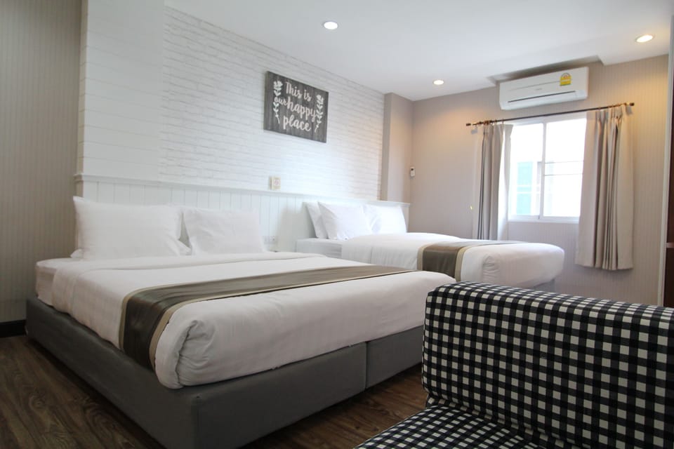 Family Quadruple Room, 2 Double Beds | Free minibar, in-room safe, free cribs/infant beds, free WiFi