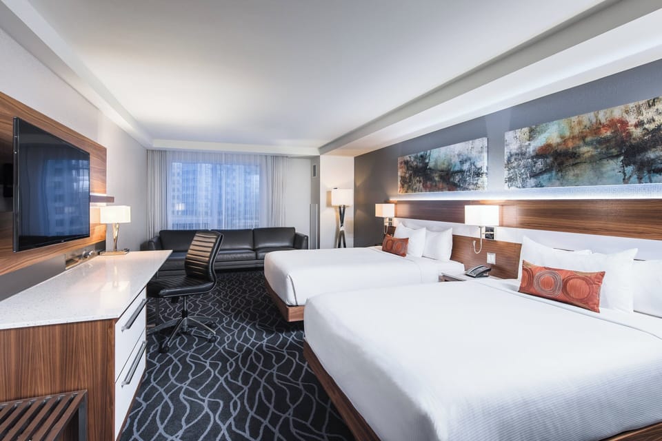 Deluxe Room, 2 Queen Beds | Pillowtop beds, in-room safe, desk, blackout drapes