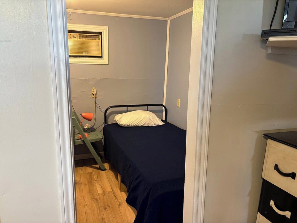 Room 3 - Detached - Connected by Porch w Bathroom - 4 Twins 1 Full