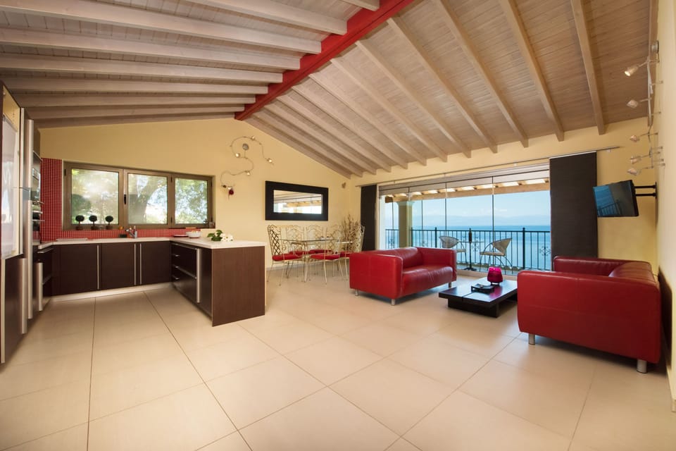 Panoramic Penthouse, Terrace, Sea View | Living area | 20-inch TV with cable channels