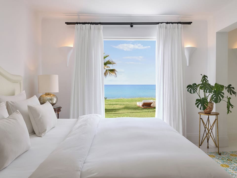 2 Bedroom Beach Villa Seafront | Minibar, in-room safe, individually decorated, blackout drapes