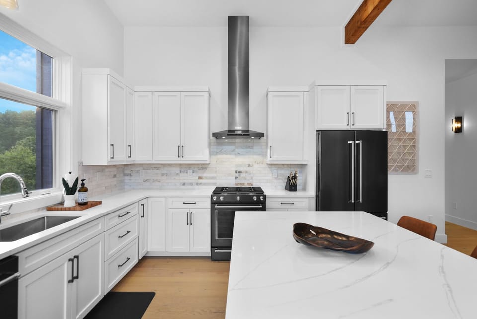 Chef-inspired kitchen with sleek finishes and high-end appliances