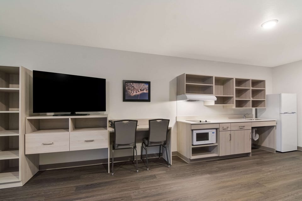 Individually furnished, desk, laptop workspace, blackout drapes
