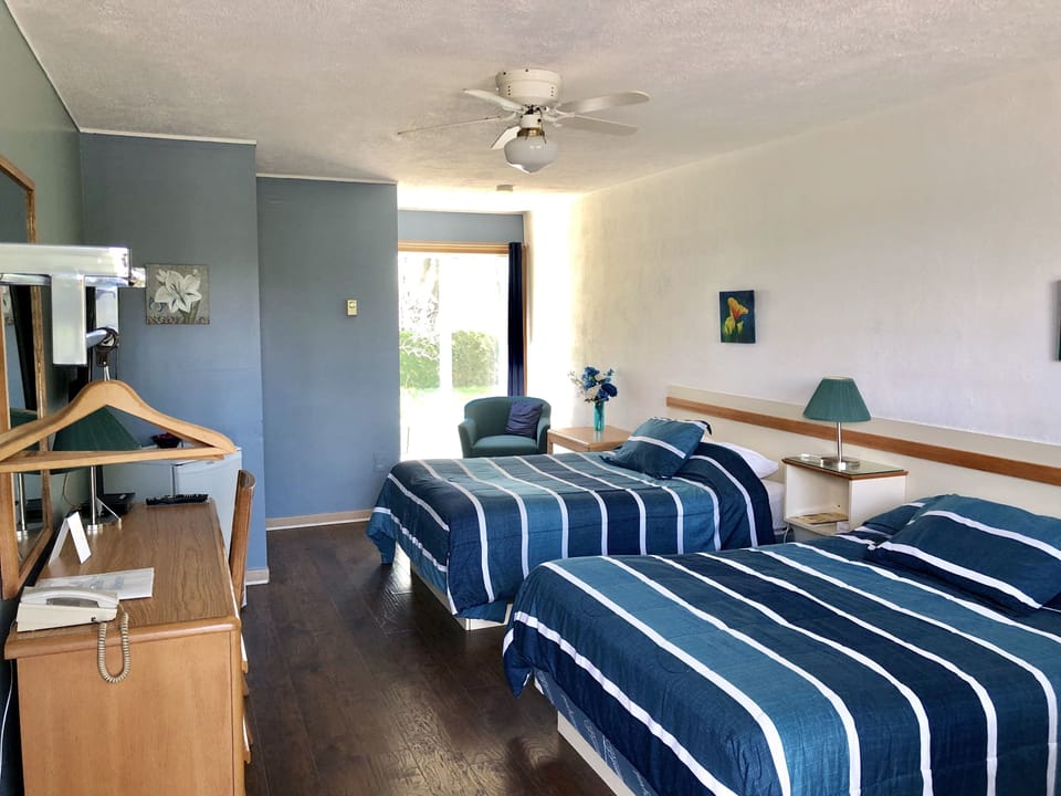 Standard Room, 2 Double Beds, River View | Iron/ironing board, free rollaway beds, free WiFi, bed sheets