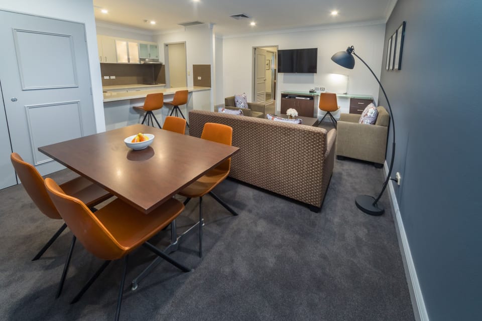 Back 2 Bedroom Apartment 301 (No View) + Light Breakfast placed in Room | Living area | 40-inch LCD TV with cable channels, TV, DVD player