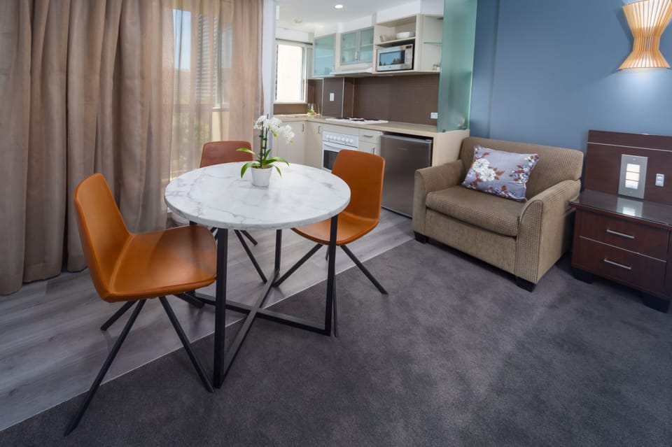 Deluxe Family Room - 4 People + Light Breakfast placed in Room | Living area | 40-inch LCD TV with cable channels, TV, DVD player
