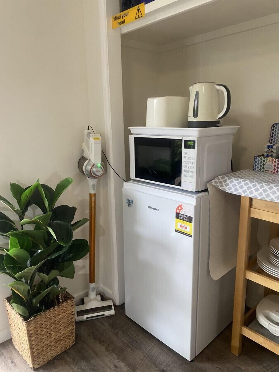 Fridge, microwave, vacuum, kettle and toaster.