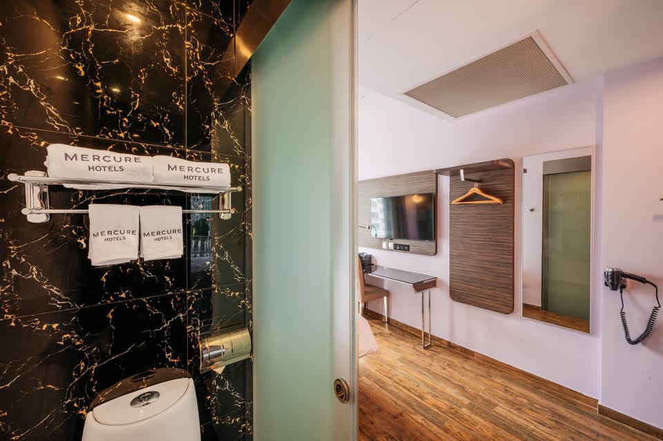 Shower, eco-friendly toiletries, hair dryer, bidet