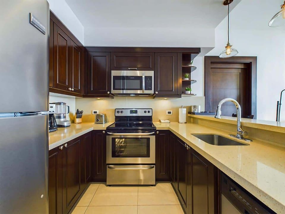 Open kitchen, stainless steel appliances