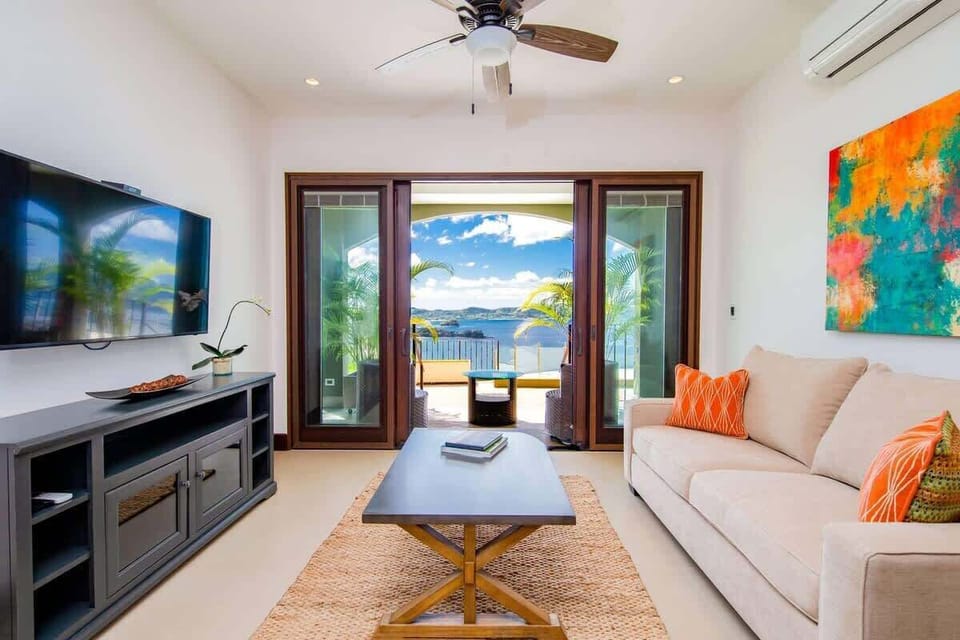 Living area and large flat screen TV, ocean view