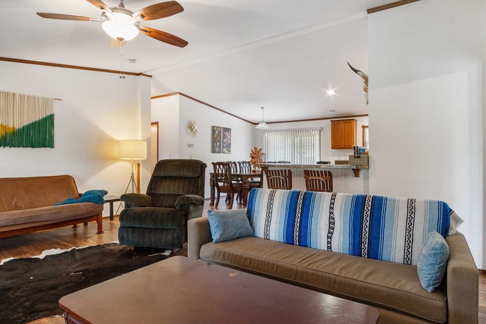 The roomy futon on the living area here comfortably sleeps two, along with the three bedrooms, that's sweet slumber space for eight!