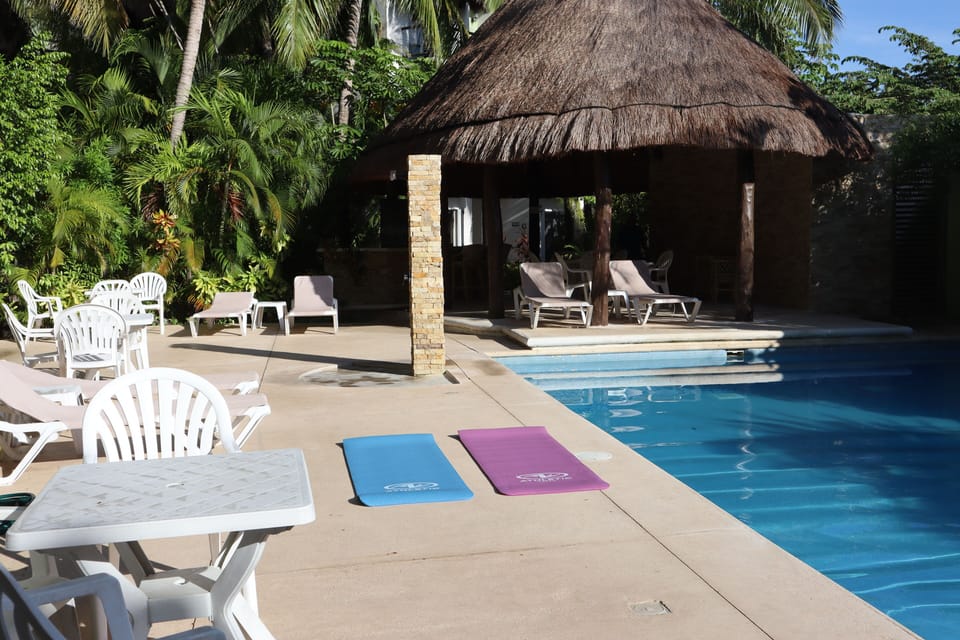Shaded palapa with free WiFi, chairs and tables, full bathroom with shower!