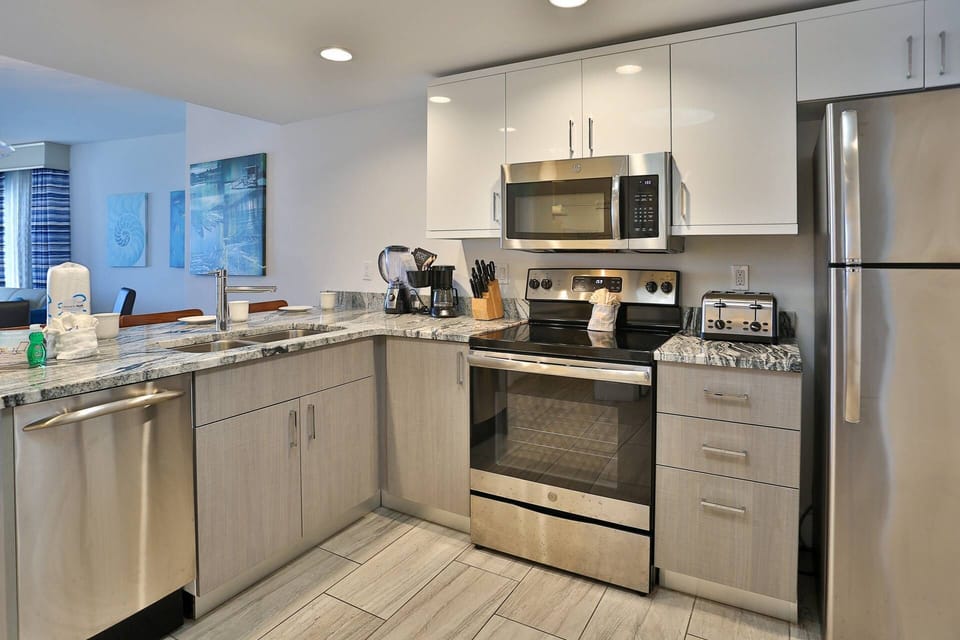 Fully Equipped Kitchen with all Stainless Appliances and Granite Counters