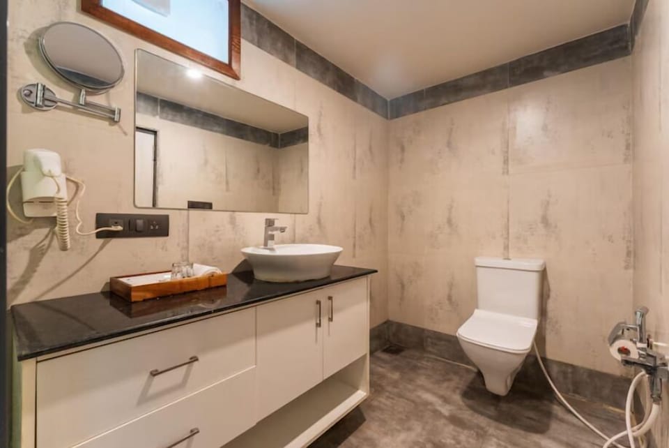 Shower, free toiletries, hair dryer, slippers
