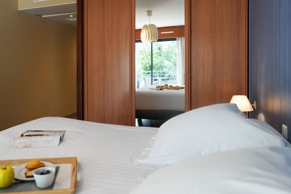 Comfort Quadruple Room | In-room safe, iron/ironing board, free WiFi, bed sheets