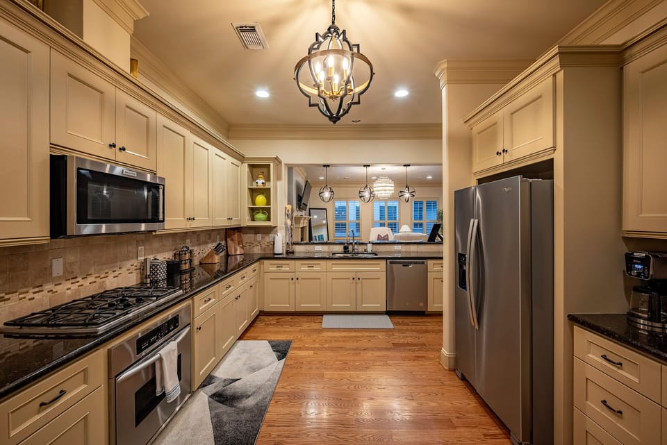 Large kitchen with kitchenware and tools for your cooking