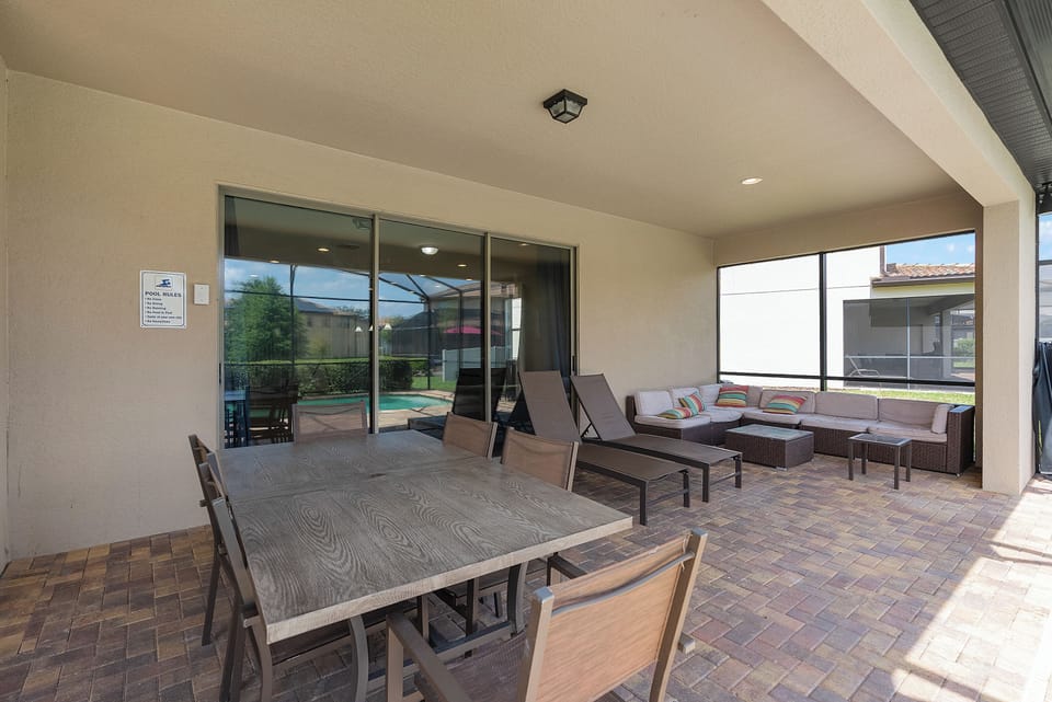 Spacious shaded lanai with a table for 6