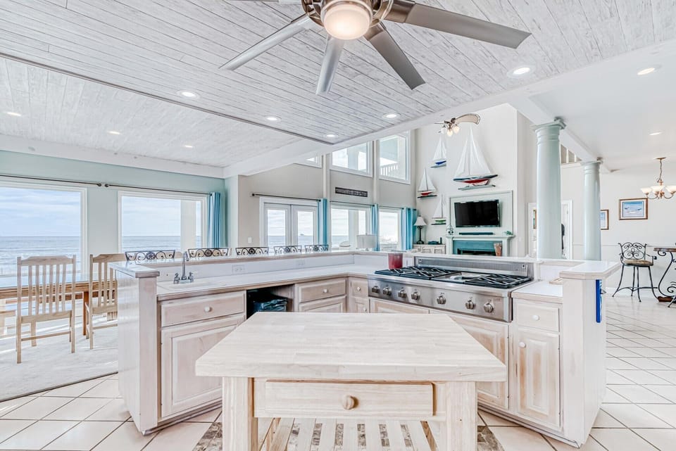 Kitchen - Upgraded appliances including a 6 - burner gas stove