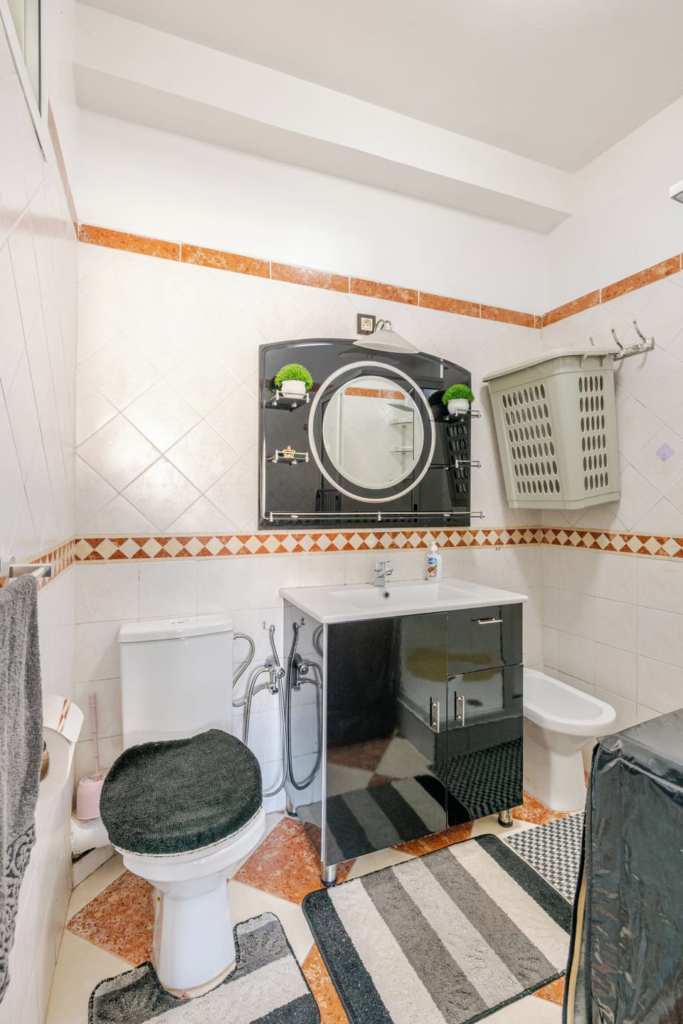 Modern bathroom with all essentials for your comfort and convenience.