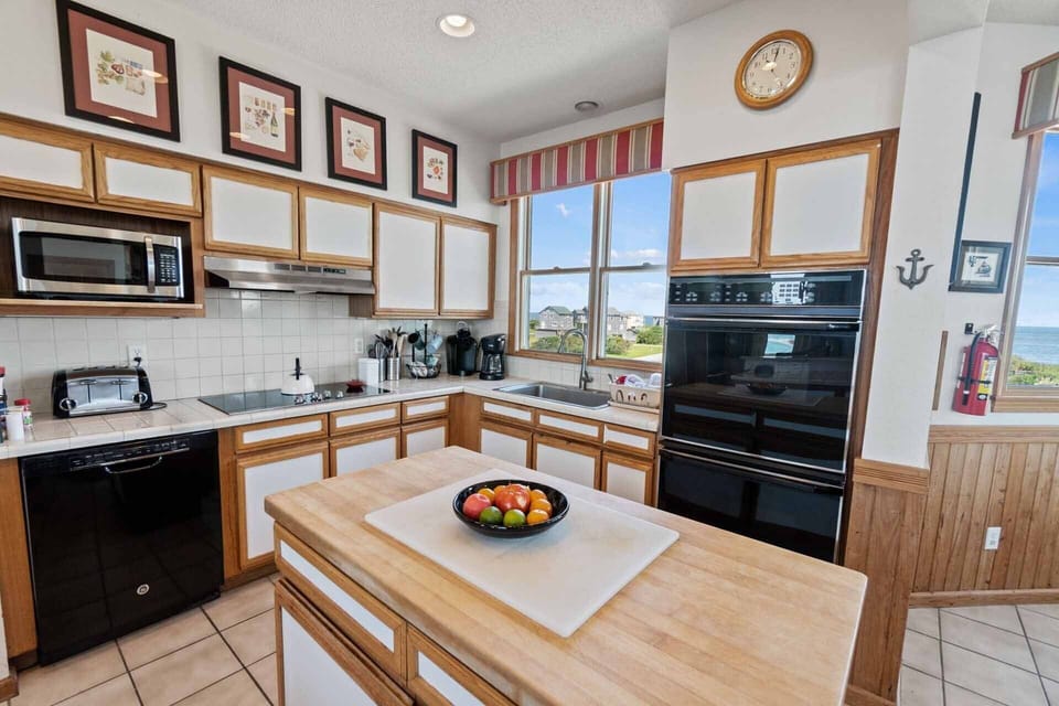 Planning and creating meals is a breeze in this deluxe, expansive kitchen.