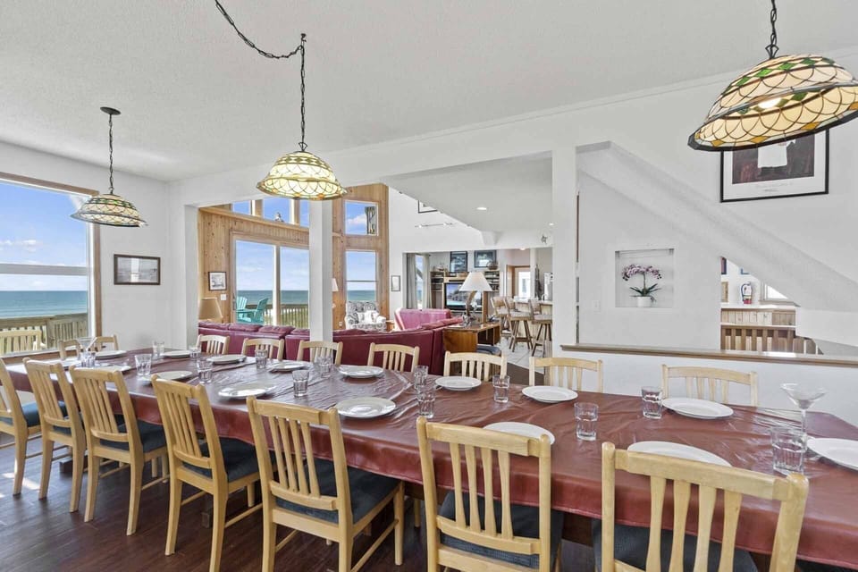 Gather everyone to enjoy luxuriously slow meals together at a long table that can accommodate 18.