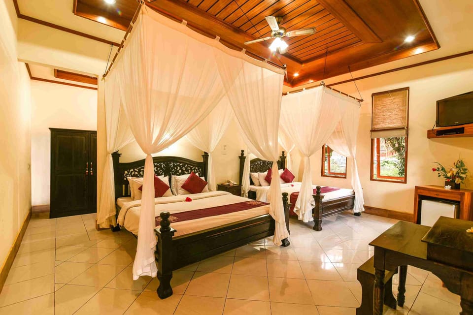 Family Suite with Garden View | Egyptian cotton sheets, minibar, in-room safe, desk