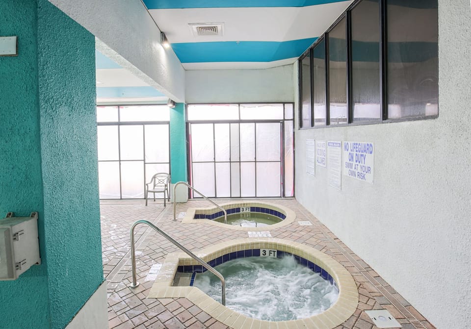 Experience poolside jacuzzi serenity, where our jacuzzi is nestled within a vibrant pool area, offering a refreshing and social space to enjoy the warmth of the water.