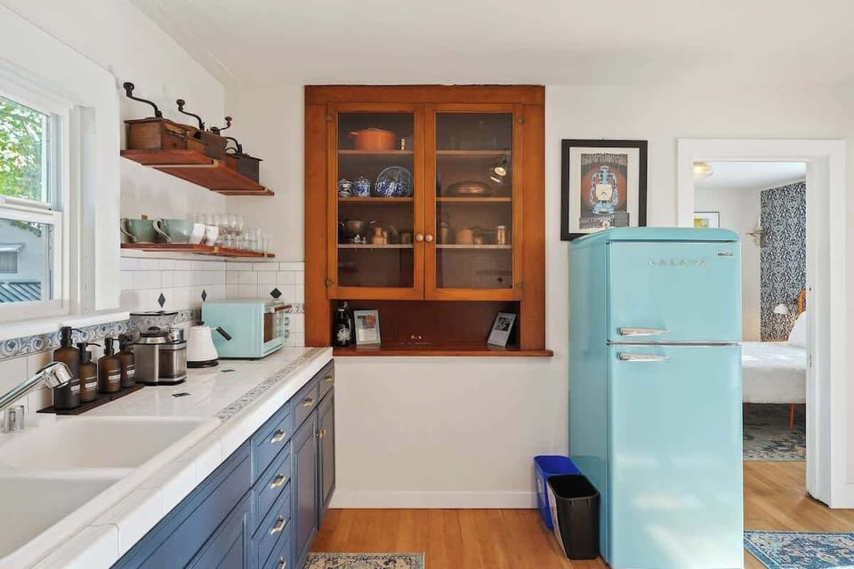 We have a good sized fridge and pantry area to store food and the essentials to make some good coffee. It is fully stocked so you will find dishes, pots and pans, and more!