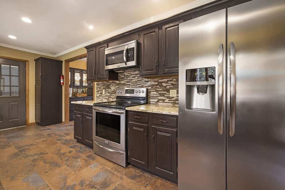 Kitchen refrigirator, stove top, oven and microwave