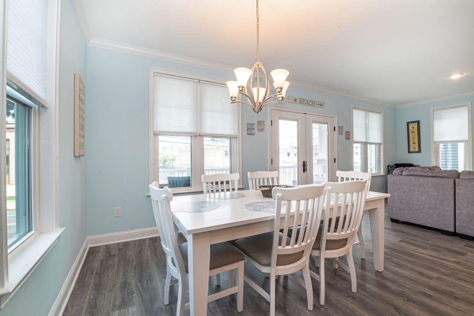 Spacious open-concept kitchen and dining area with seating for 10