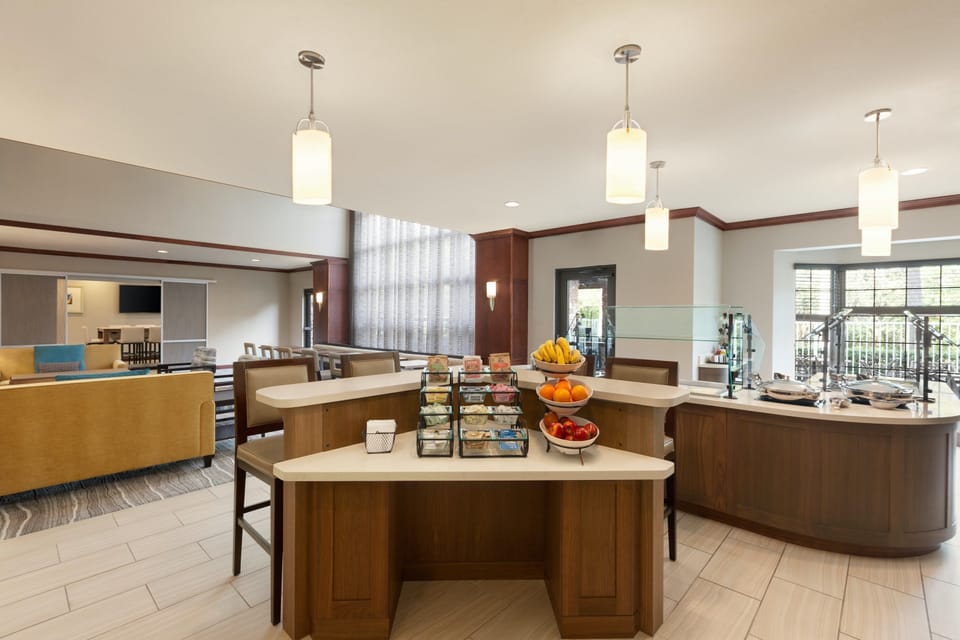 Start your day with a complimentary breakfast featuring fresh fruit, hot options, and a welcoming dining space